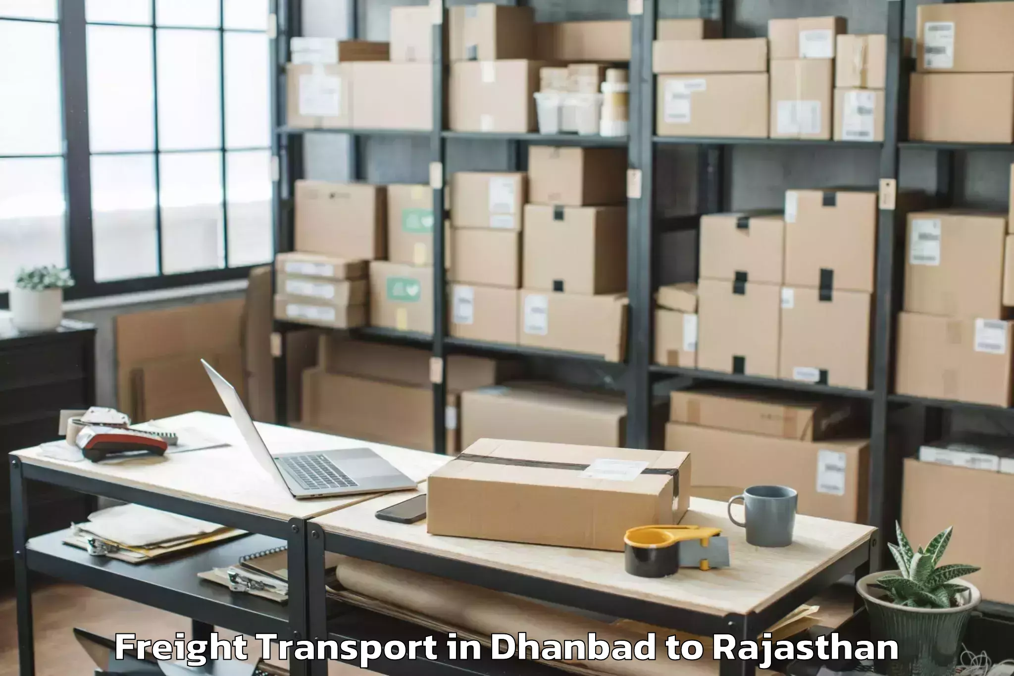 Hassle-Free Dhanbad to Madhav University Pindwara Freight Transport